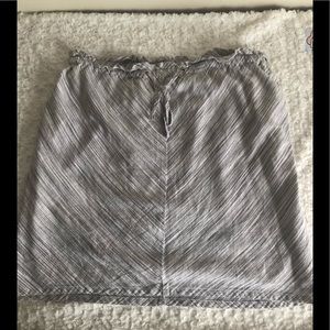 - Adorable light gray and white skirt